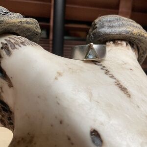 Gold , silver with an aquamarine